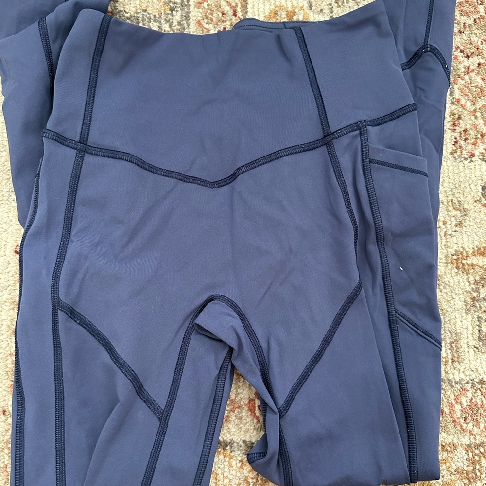 Lululemon wunder train high rise with pockets. Size 4. Periwinkle color